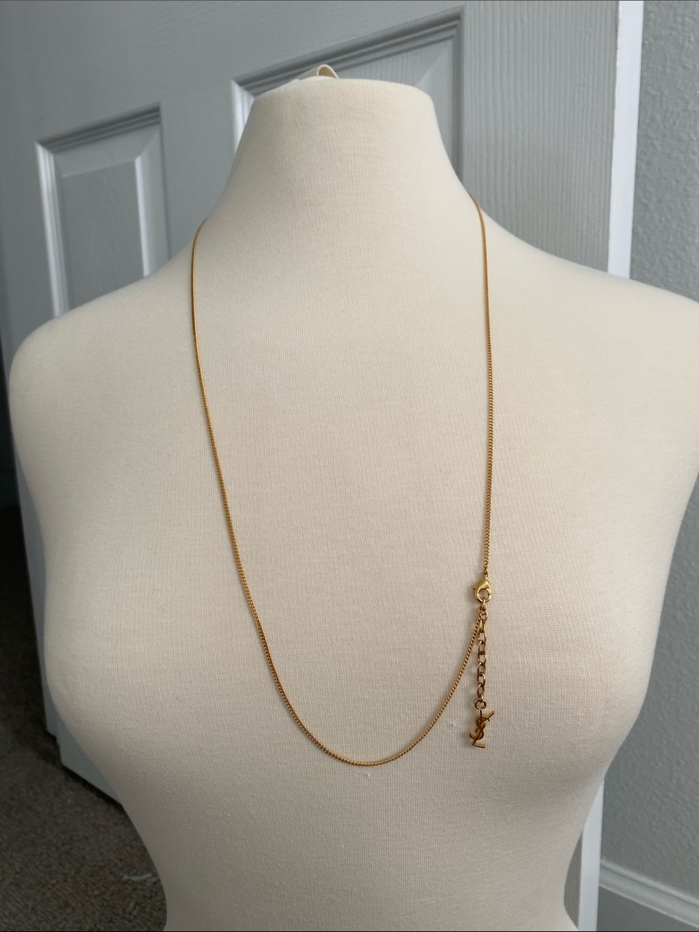 Yves Saint Laurent Slim Gold Tone Long Necklace with YSL Lobster Claw 15"